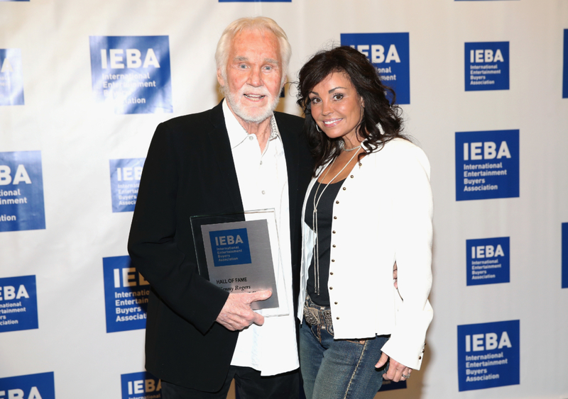 Kenny Rogers and Wanda Miller | Getty Images Photo by Terry Wyatt/IEBA