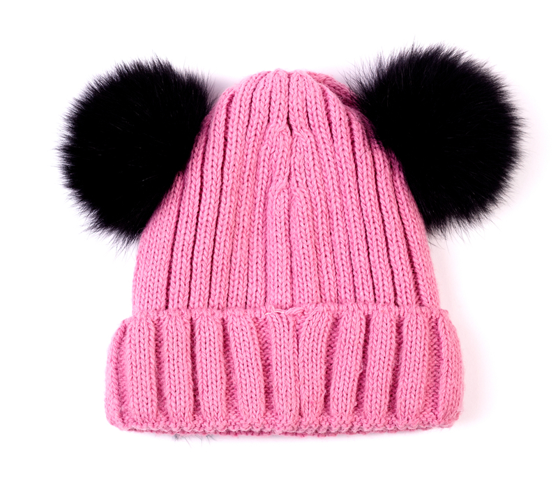 Pom-Poms on Winter Hats | Shutterstock