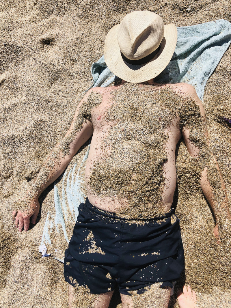 Dad Bod With Sand | Getty Images Photo by Lisa Wiltse
