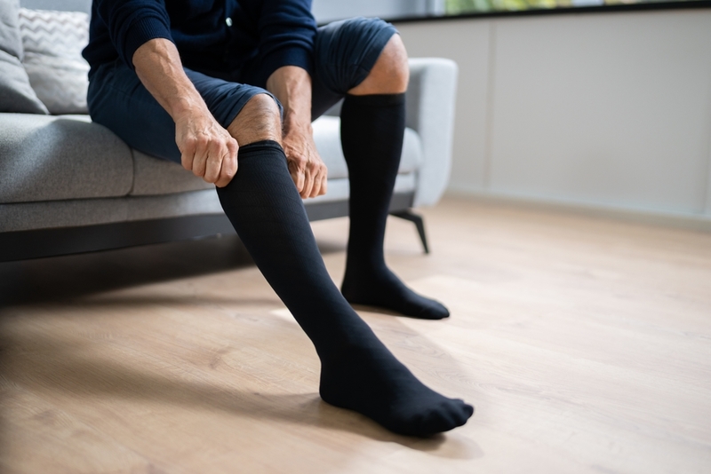 Compression Socks Are a Must-Have | Shutterstock Photo by Andrey_Popov
