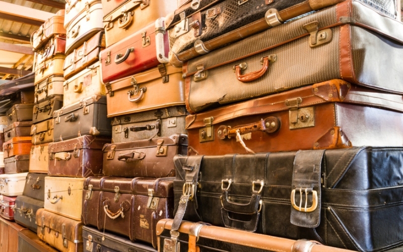 Antique Luggage Sets | Shutterstock Photo by SasinTipchai