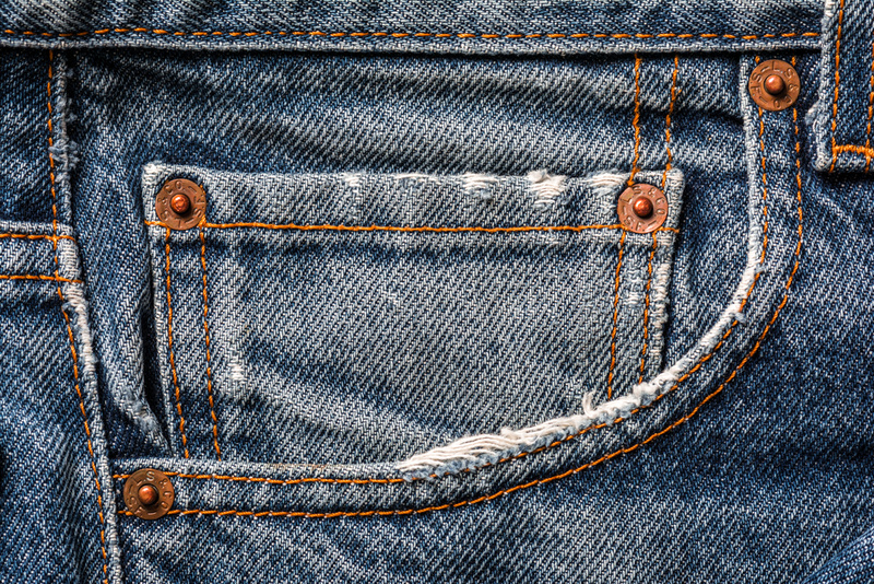 Copper Rivets on Jeans Pockets | Shutterstock