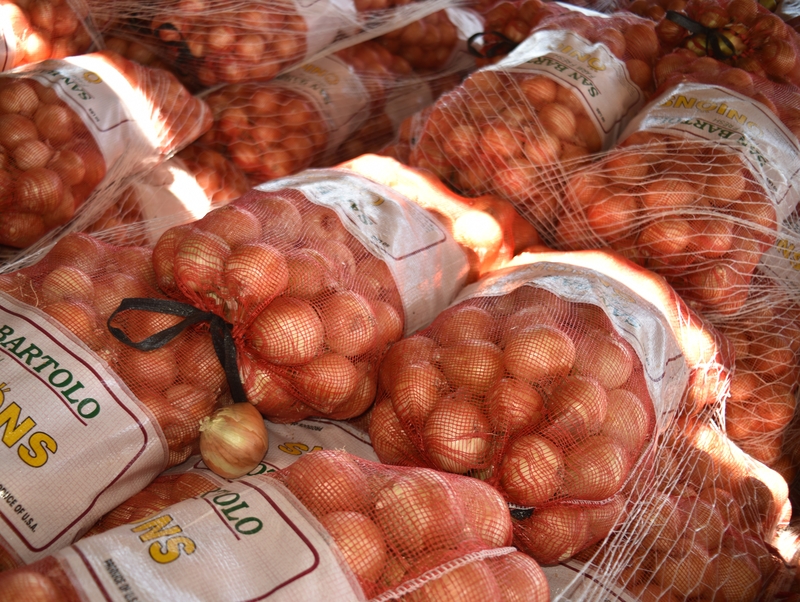 They Forced Onion Growers to Buy Their Onions | Shutterstock