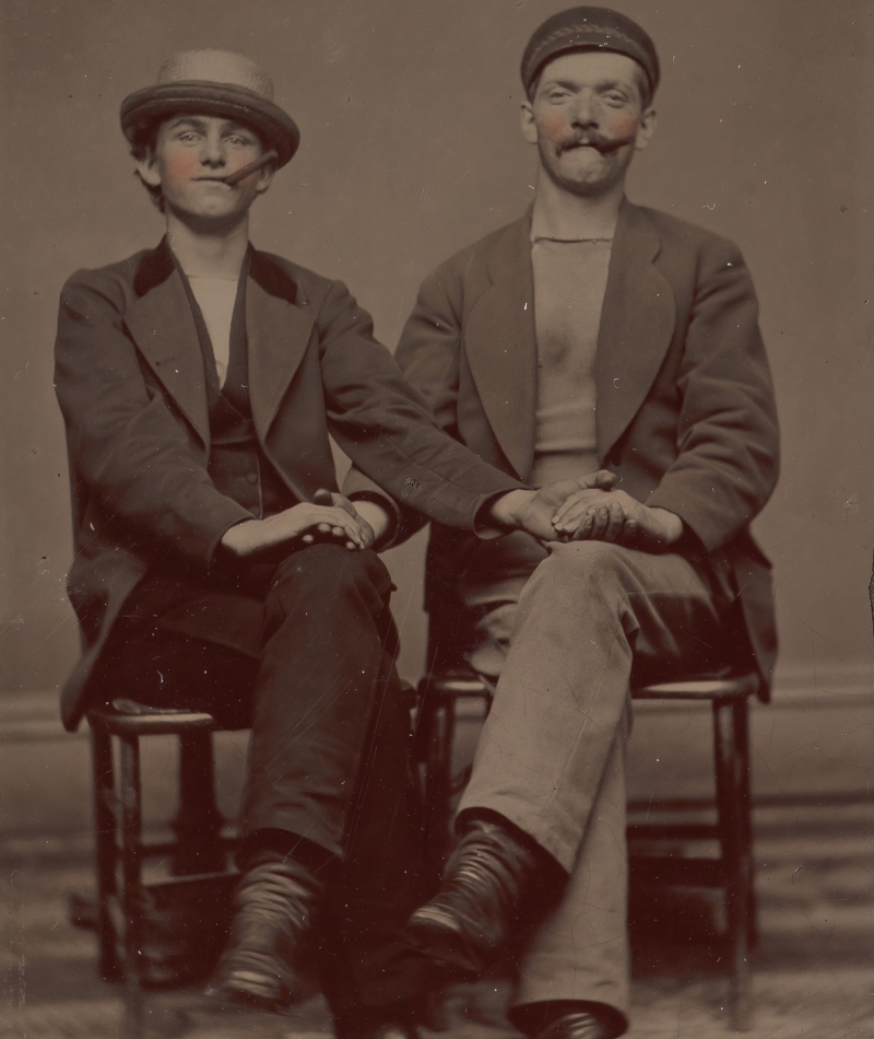 Men Holding Hands | Getty Images Photo by Heritage Art/Heritage Images