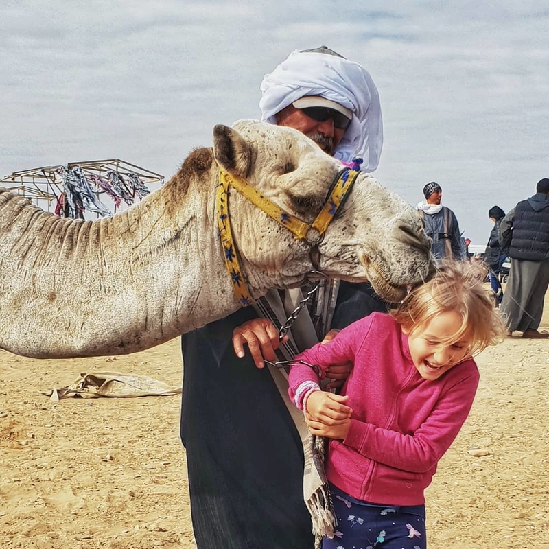 First Camel Kiss | Instagram/@ourglobetrotters